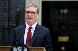 英国首相：承认巴勒斯坦国是加沙停火步骤之一
